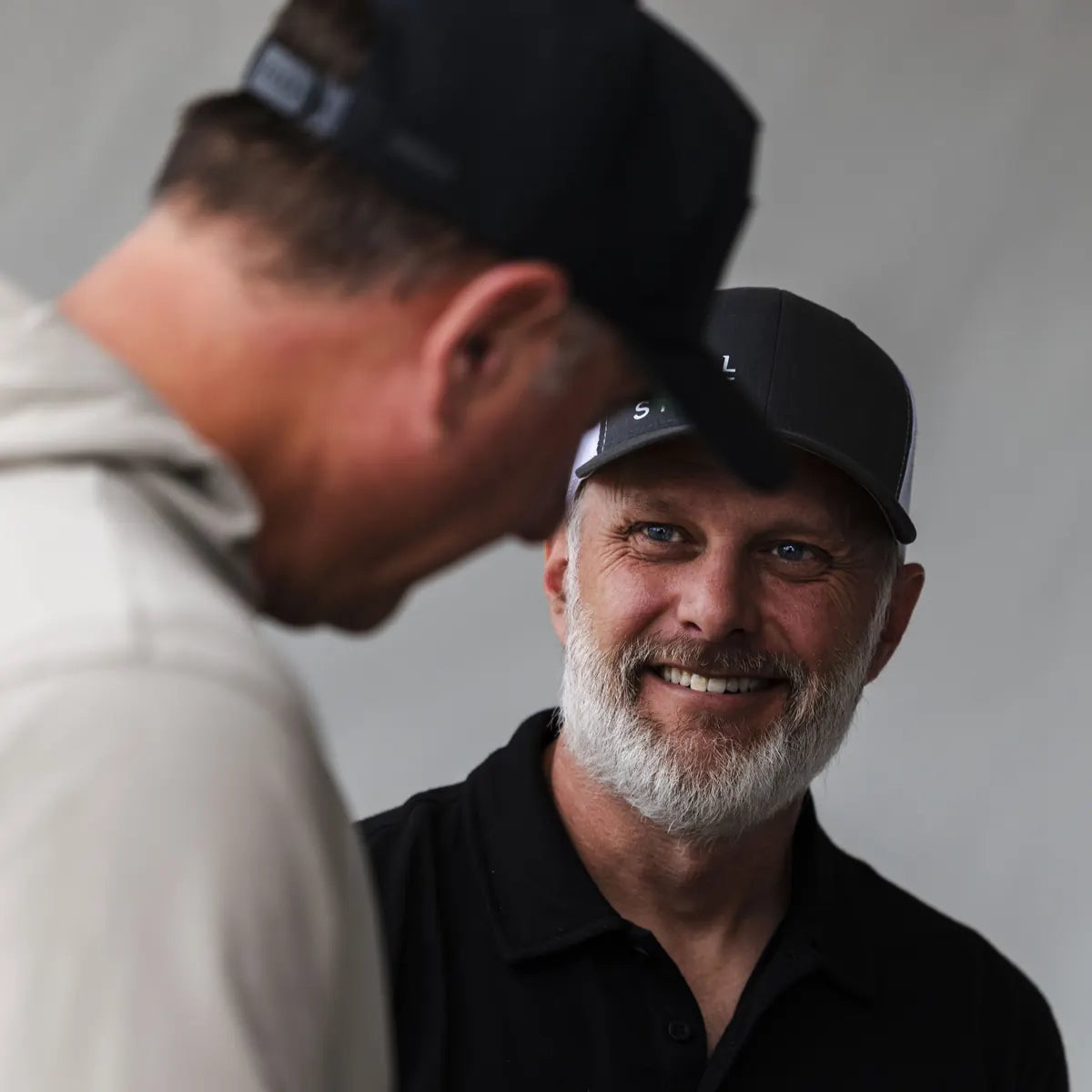 Beau speaking with an adult attendee at Pacific Airshow 2025
