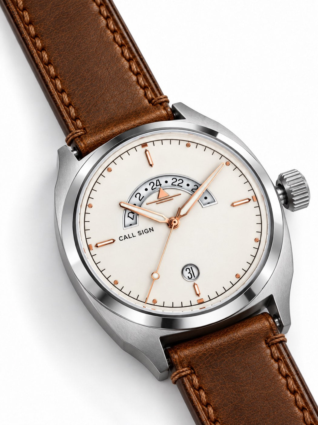 The Frost dial at an angle: crescent GMT window at 12, rose-tone hands, applied markers.