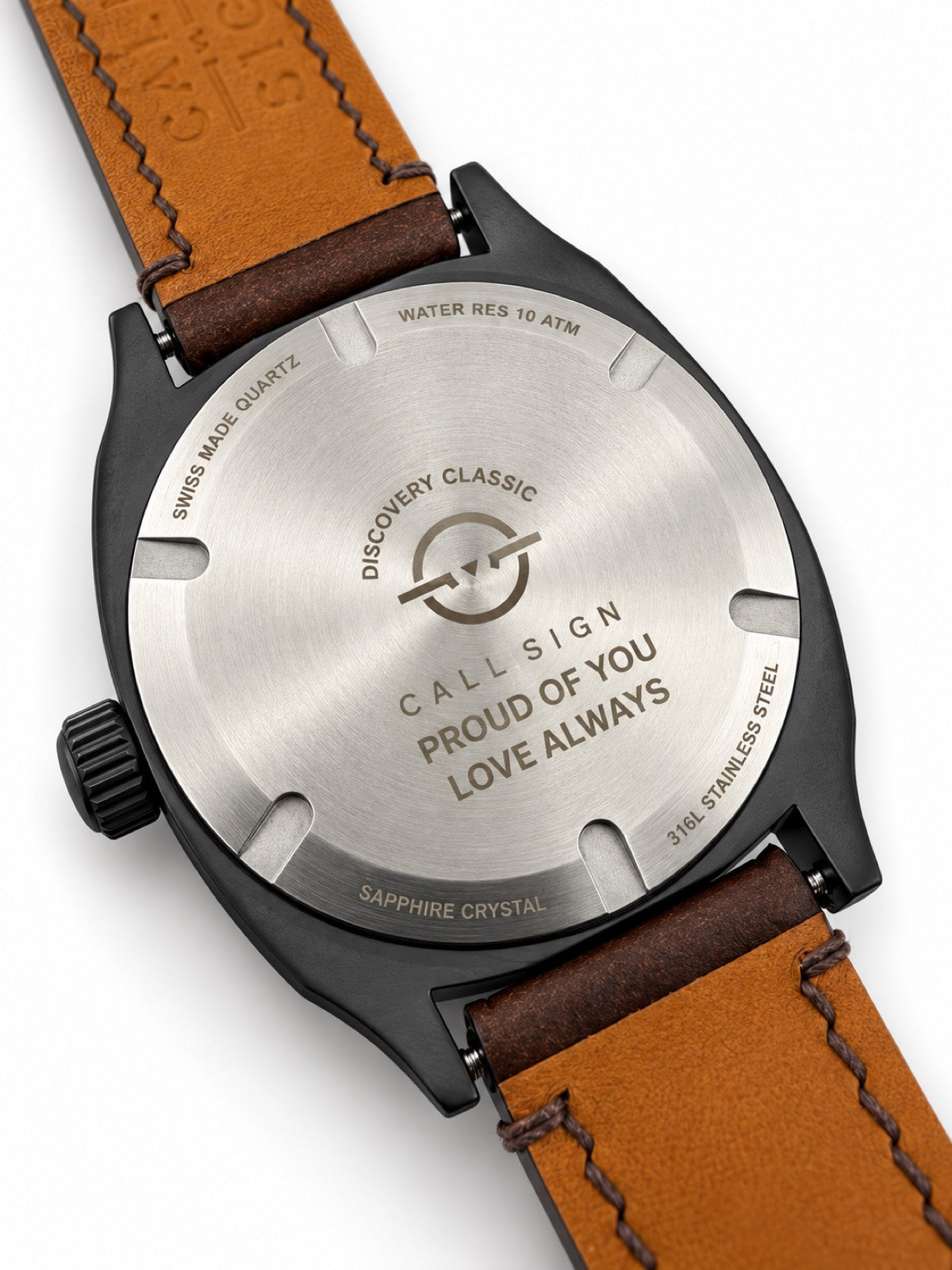 The Discovery 38 caseback engraved with two lines: PROUD OF YOU and LOVE ALWAYS.