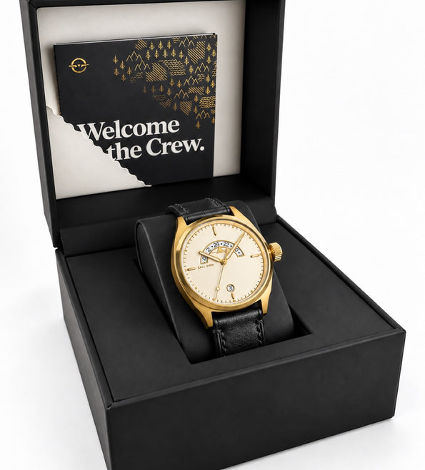 The Discovery 38 Gold on black leather in its black Call Sign presentation box.