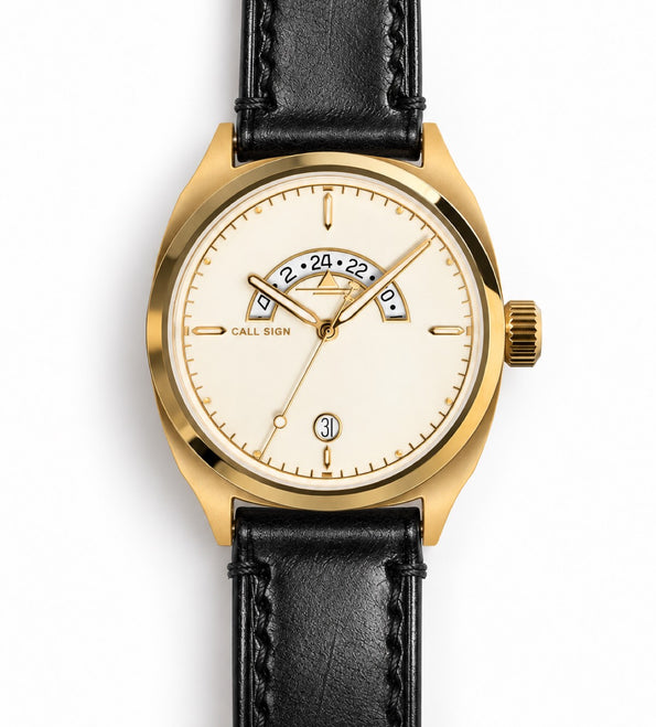Discovery 38 Gold from the front: cream dial, gold-tone case, black leather strap.