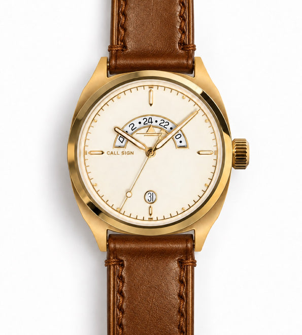 Discovery 38 Gold from the front: cream dial, gold-tone case, brown leather strap.