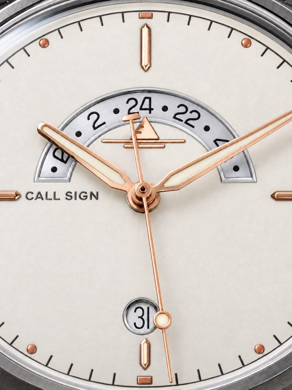Discovery Frost 38: white dial with a rose finish, steel case, brown leather strap.