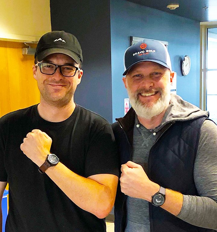 Andrew H. and Beau Garrett showing their watches.