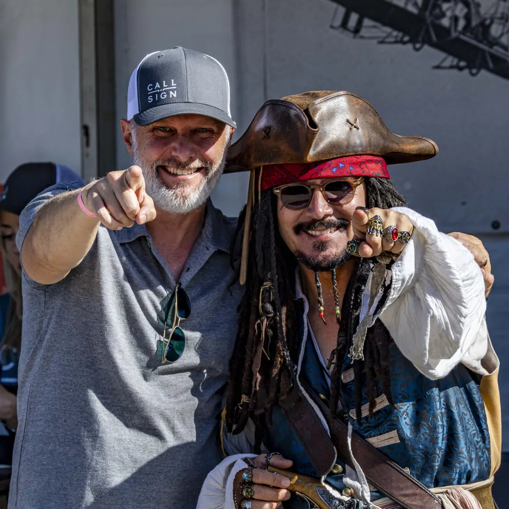 Beau with an adult aviation attendee at Pacific Airshow 2025