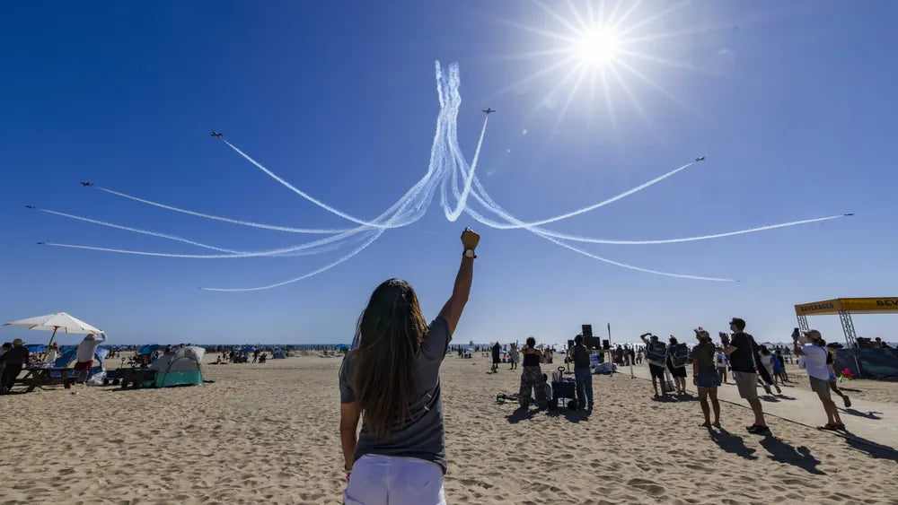 Pacific Airshow crowd watching aircraft overhead in 2025