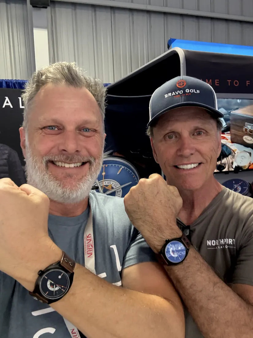 Beau and an adult Call Sign customer showing their watches together
