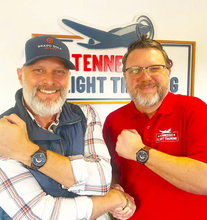 Chris E. with another adult wearing Bravo Golf watches